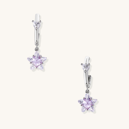 Drop earrings with purple star-shaped zirconia stones and clear teardrop accents in gold-plated brass setting
